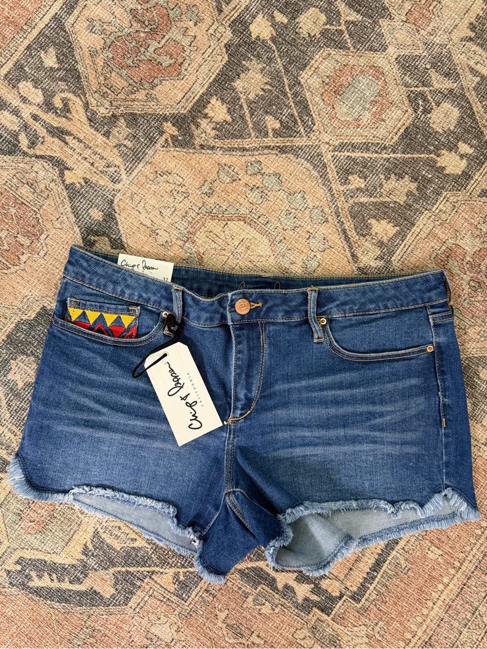Chip & Pepper Blue Denim Jean Cutoff Shorts with Embroidered Pocket Detail